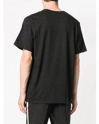 schwarzes bedrucktes T-Shirt mit einem Rundhalsausschnitt von Pressure