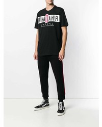 schwarzes bedrucktes T-Shirt mit einem Rundhalsausschnitt von Diesel