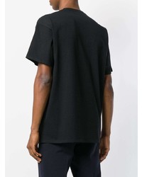 schwarzes bedrucktes T-Shirt mit einem Rundhalsausschnitt von Raf Simons