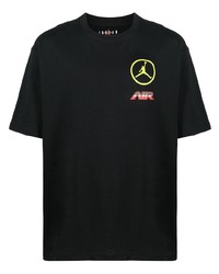 schwarzes bedrucktes T-Shirt mit einem Rundhalsausschnitt von Nike