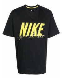 schwarzes bedrucktes T-Shirt mit einem Rundhalsausschnitt von Nike