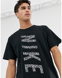 schwarzes bedrucktes T-Shirt mit einem Rundhalsausschnitt von Nike Running