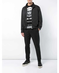 schwarzes bedrucktes T-Shirt mit einem Rundhalsausschnitt von Undercover