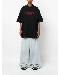 schwarzes bedrucktes T-Shirt mit einem Rundhalsausschnitt von Vetements