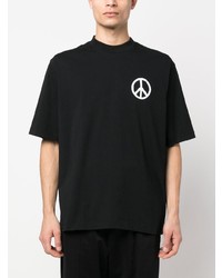 schwarzes bedrucktes T-Shirt mit einem Rundhalsausschnitt von Marcelo Burlon County of Milan