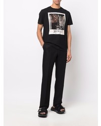 schwarzes bedrucktes T-Shirt mit einem Rundhalsausschnitt von Roberto Cavalli