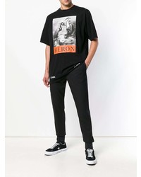 schwarzes bedrucktes T-Shirt mit einem Rundhalsausschnitt von Heron Preston