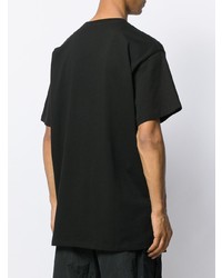 schwarzes bedrucktes T-Shirt mit einem Rundhalsausschnitt von Ih Nom Uh Nit