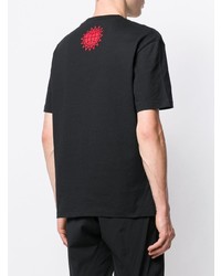 schwarzes bedrucktes T-Shirt mit einem Rundhalsausschnitt von McQ Alexander McQueen