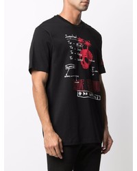 schwarzes bedrucktes T-Shirt mit einem Rundhalsausschnitt von Diesel