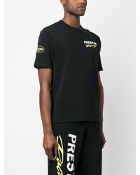 schwarzes bedrucktes T-Shirt mit einem Rundhalsausschnitt von Heron Preston