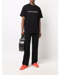 schwarzes bedrucktes T-Shirt mit einem Rundhalsausschnitt von Vetements