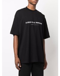 schwarzes bedrucktes T-Shirt mit einem Rundhalsausschnitt von Vetements