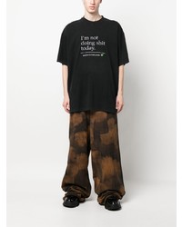 schwarzes bedrucktes T-Shirt mit einem Rundhalsausschnitt von Vetements