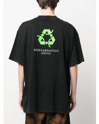 schwarzes bedrucktes T-Shirt mit einem Rundhalsausschnitt von Vetements