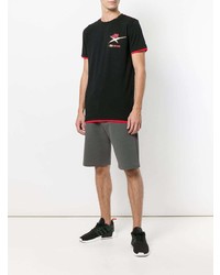 schwarzes bedrucktes T-Shirt mit einem Rundhalsausschnitt von Plein Sport