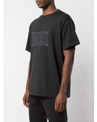 schwarzes bedrucktes T-Shirt mit einem Rundhalsausschnitt von Maison Margiela