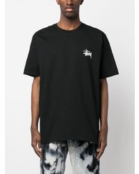 schwarzes bedrucktes T-Shirt mit einem Rundhalsausschnitt von Stussy