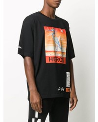 schwarzes bedrucktes T-Shirt mit einem Rundhalsausschnitt von Heron Preston