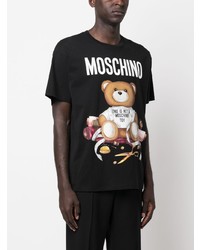 schwarzes bedrucktes T-Shirt mit einem Rundhalsausschnitt von Moschino