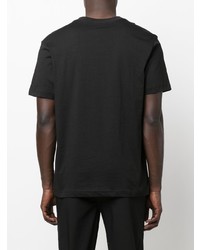 schwarzes bedrucktes T-Shirt mit einem Rundhalsausschnitt von Calvin Klein Jeans