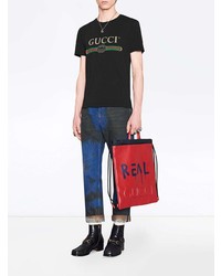 schwarzes bedrucktes T-Shirt mit einem Rundhalsausschnitt von Gucci
