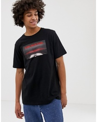 schwarzes bedrucktes T-Shirt mit einem Rundhalsausschnitt von Weekday