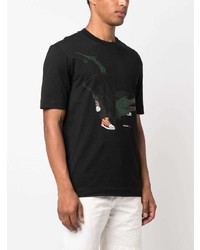 schwarzes bedrucktes T-Shirt mit einem Rundhalsausschnitt von Lacoste