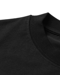 schwarzes bedrucktes T-shirt von McQ