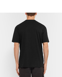 schwarzes bedrucktes T-shirt von McQ