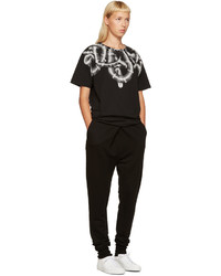 schwarzes bedrucktes T-shirt von Marcelo Burlon County of Milan