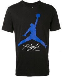 schwarzes bedrucktes T-shirt von Nike