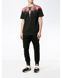 schwarzes bedrucktes T-shirt von Marcelo Burlon County of Milan