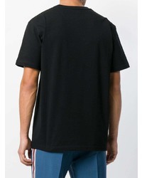 schwarzes besticktes T-Shirt mit einem Rundhalsausschnitt von Calvin Klein 205W39nyc