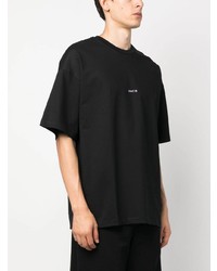 schwarzes besticktes T-Shirt mit einem Rundhalsausschnitt von Oamc