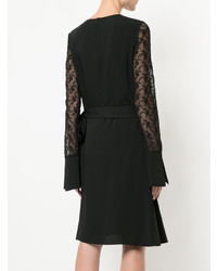 schwarzes gerade geschnittenes Kleid mit Rüschen von Goen.J