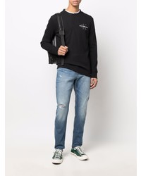 schwarzes Langarmshirt mit einer Knopfleiste von Calvin Klein Jeans