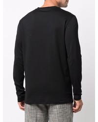 schwarzes Langarmshirt mit einer Knopfleiste von Balmain