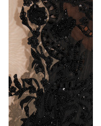 schwarzes figurbetontes Kleid aus Pailletten