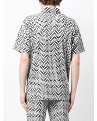 schwarzes Polohemd mit Karomuster von Homme Plissé Issey Miyake