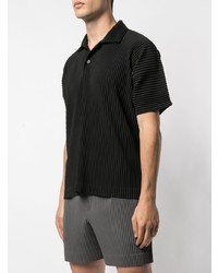 schwarzes Polohemd von Homme Plissé Issey Miyake