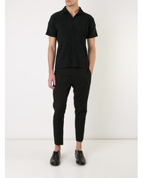 schwarzes Polohemd von Homme Plissé Issey Miyake