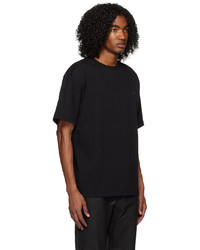 schwarzes Strick T-Shirt mit einem Rundhalsausschnitt von XLIM