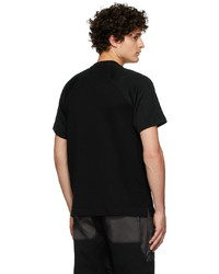 schwarzes Strick T-Shirt mit einem Rundhalsausschnitt von Byborre