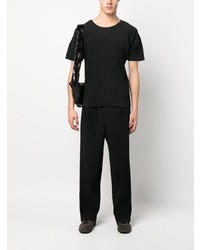 schwarzes Strick T-Shirt mit einem Rundhalsausschnitt von Homme Plissé Issey Miyake