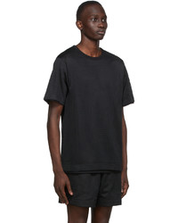 schwarzes T-Shirt mit einem Rundhalsausschnitt aus Netzstoff von Dries Van Noten