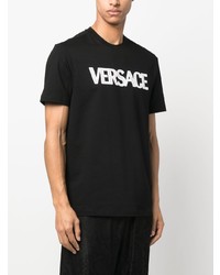 schwarzes T-Shirt mit einem Rundhalsausschnitt aus Netzstoff von Versace