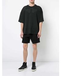 schwarzes T-Shirt mit einem Rundhalsausschnitt aus Netzstoff von Fear Of God