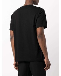 schwarzes T-Shirt mit einem Rundhalsausschnitt mit Blumenmuster von Comme Des Garcons Homme Plus