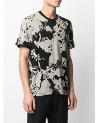 schwarzes T-Shirt mit einem Rundhalsausschnitt mit Blumenmuster von Moncler